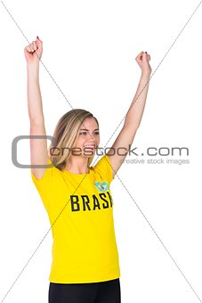 Excited football fan in brasil tshirt