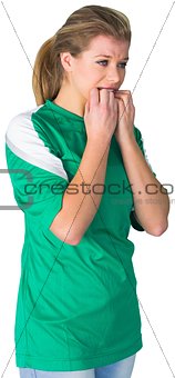 Nervous football fan in green