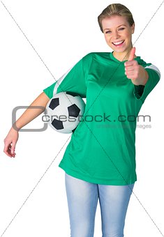 Happy football fan in green