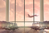Airplane flying past departures lounge window