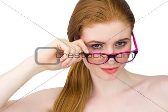 Beautiful redhead posing with glasses