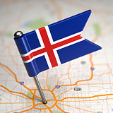 Iceland Small Flag on a Map Background.
