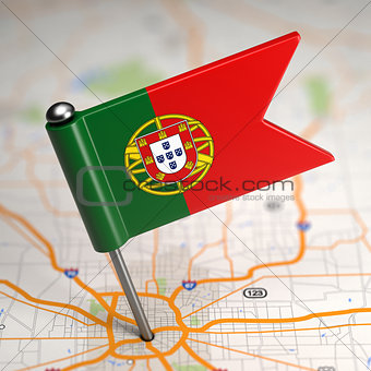 Portugal Small Flag on a Map Background.