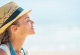 Portrait of relaxed young woman in hat