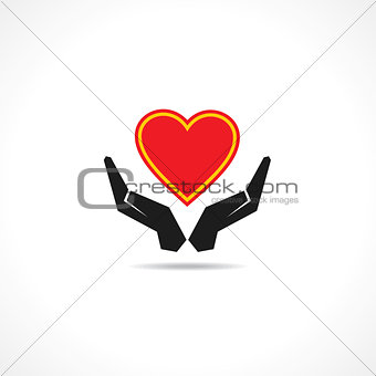 Hand protecting a heart icon