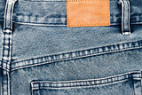 Label sewed on a blue jeans   