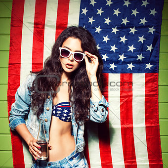 beautiful sexy long haired girl against american flag