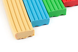 Color children's plasticine on a white background