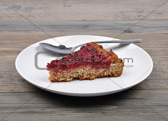 Red currant cake on wood