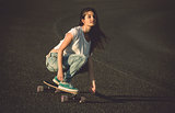 Skater girl making dowhill