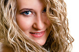 portrait of a beautiful young girl with long blond wavy hair
