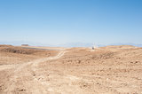 Travel on an empty desert landscape