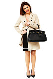 Pretty business woman with black bag