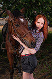 girl in a shirt and a horse