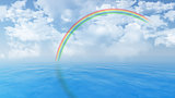 Blue ocean landscape with rainbow