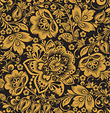 Seamless floral pattern. Beige flowers on a gold background.