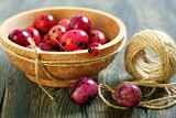 Easter eggs in wooden bowl.