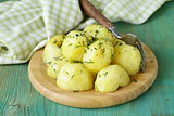 boiled fresh organic potatoes with the oil and dill