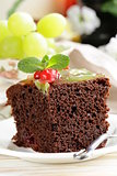 chocolate brownie cake decorated with different fruits