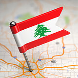 Lebanon Small Flag on a Map Background.