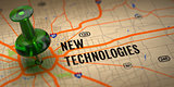 New Technologies - Green Pushpin on a Map Background.