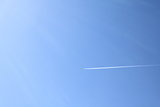 Airplane in blue sky