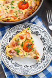 Omelet with ham and cherry tomatoes