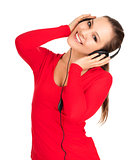 Happy young woman listening to music, white background