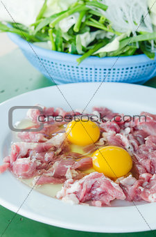 yolk egg and raw meat