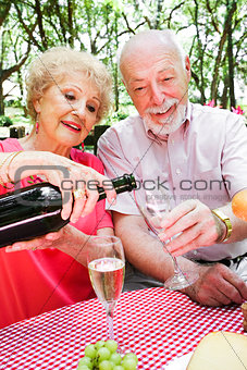 Senior Picnic - Pouring Champagne
