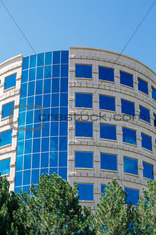 Round Stone Building with Blue Windows