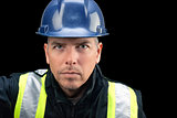 Construction Worker Looks To Camera