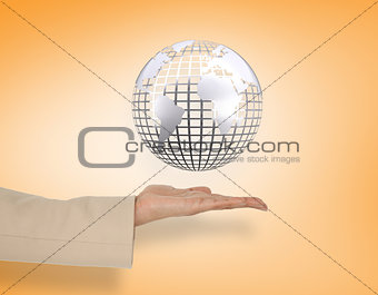 Composite image of female hand presenting silver globe