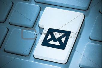 Composite image of envelope on enter key