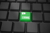 Learning on black keyboard with green key