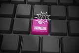 Knowledge on black keyboard with purple key
