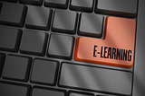 E-learning on black keyboard with brown key