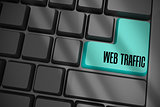 Web traffic on black keyboard with blue key
