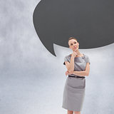 Thoughtful woman posing in dress with speech bubble