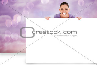 Composite image of pretty brunette showing card
