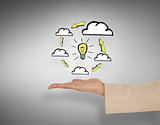 Composite image of female hand presenting cloud computing graphic