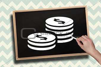 Composite image of hand drawing coins with chalk