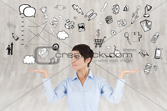 Composite image of businesswoman with an open hand to show graphics