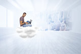 Composite image of man wearing glasses sitting on cloud using laptop and looking at camera