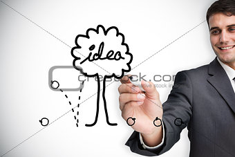 Composite image of businessman drawing idea tree