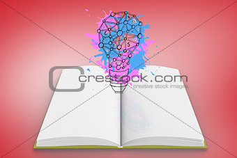 Composite image of light bulb on paint splashes on open book