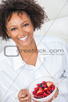 Mixed Race African American Woman Eating Fruit