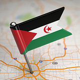 Sahrawi Republic Small Flag on a Map Background.