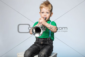 Child Blowing Trumpet