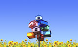 Colorful nesting boxes and sunflowers